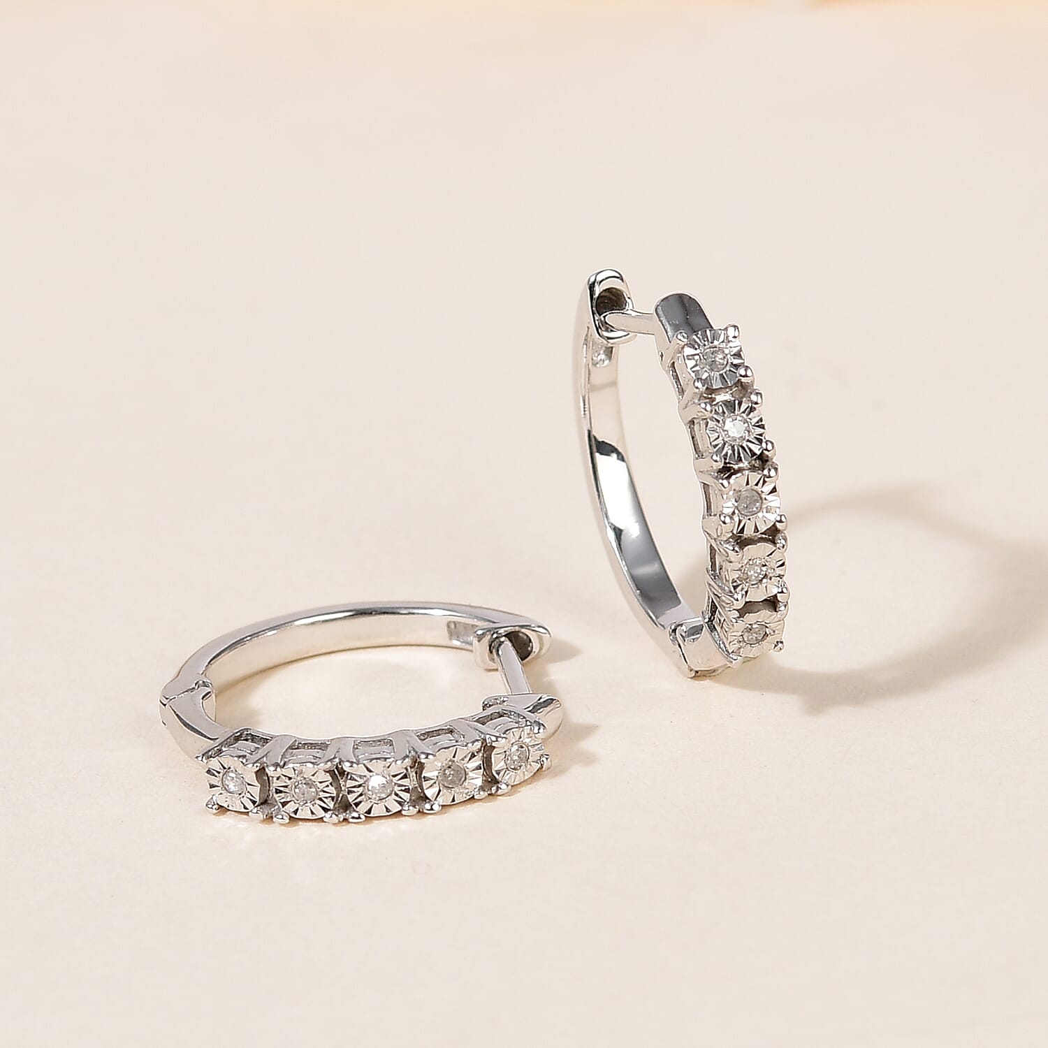 Diamond Accent Hoop Earrings in Platinum Over Sterling Silver 0.05 ctw