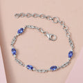 AAA Tanzanite and Moissanite Bracelet in Platinum Over Sterling Silver (6.50-8.0In) 2.75 ctw - Sticky add to cart bar